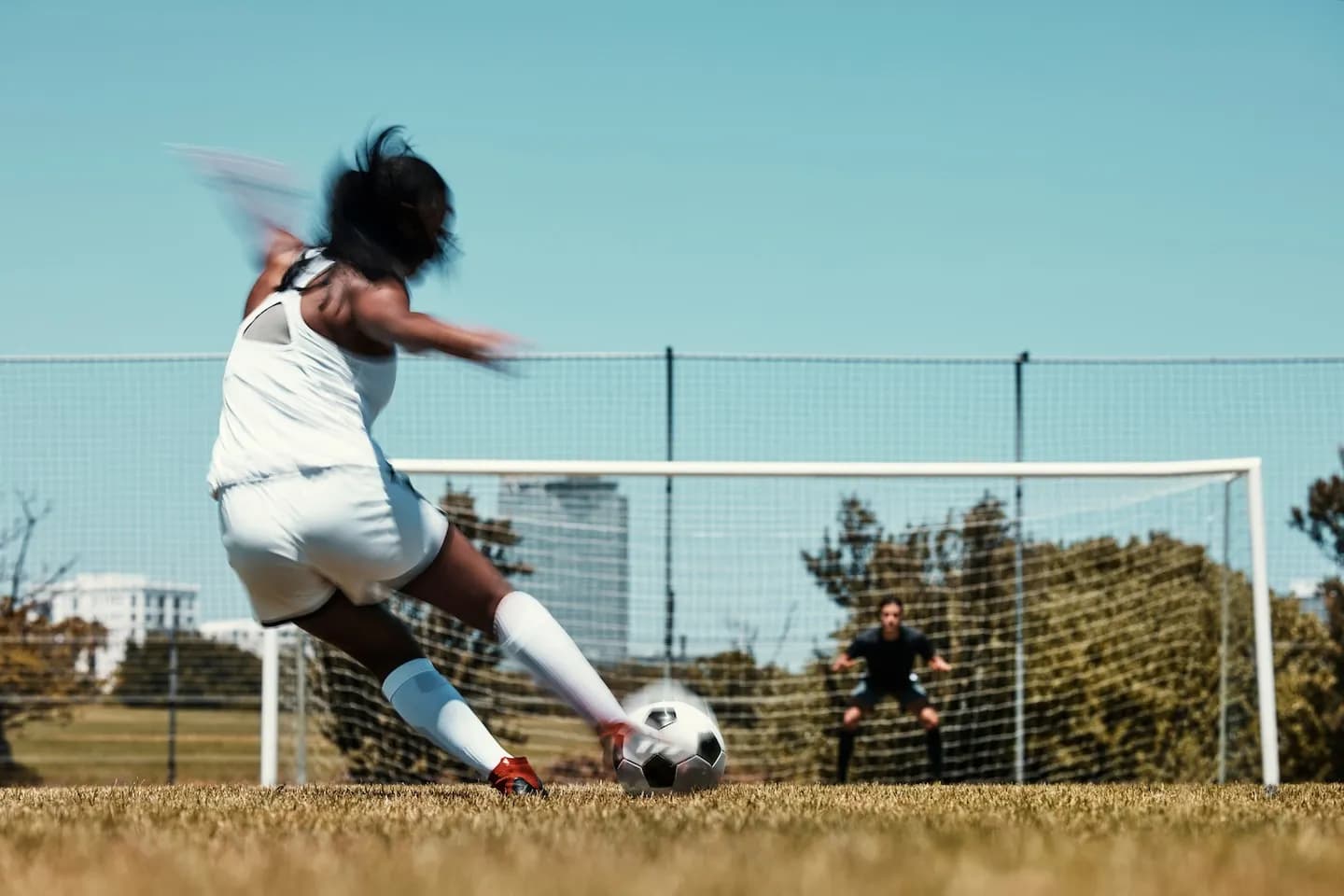 Girl playing soccer